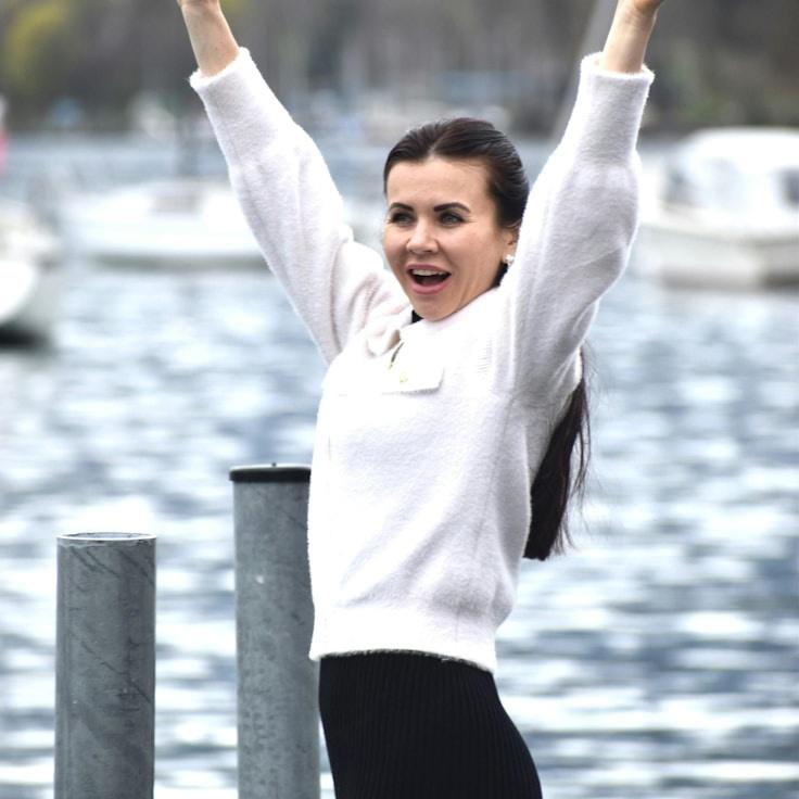 Kaveri Mehta, Lead Design Curator at Ventriloquix Tech, reviewing corporate floral arrangements